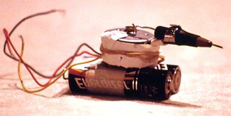 Tattoo gun made from a battery, a small motor, a sewing needle and a few wires.